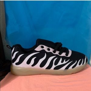 New Glow in the dark kid’s shoes size 4